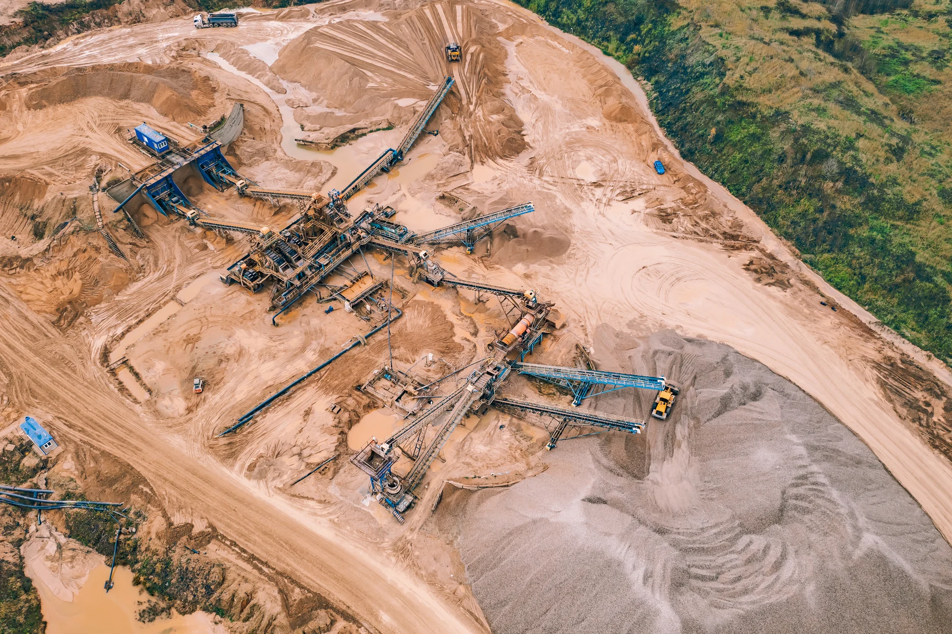 Aerial view of an open-pit operation and its intricate industrial landscape